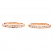 A PAIR OF CHANNEL SET DIAMOND