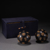 A PAIR OF CHENXIANG WOOD HAND