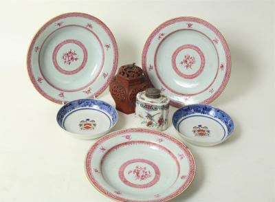 A pair of Chinese armorial saucer
