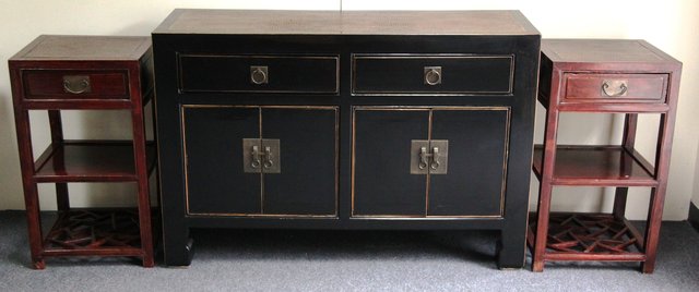 A pair of Chinese bedside tables