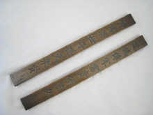 A pair of Chinese bronze scroll