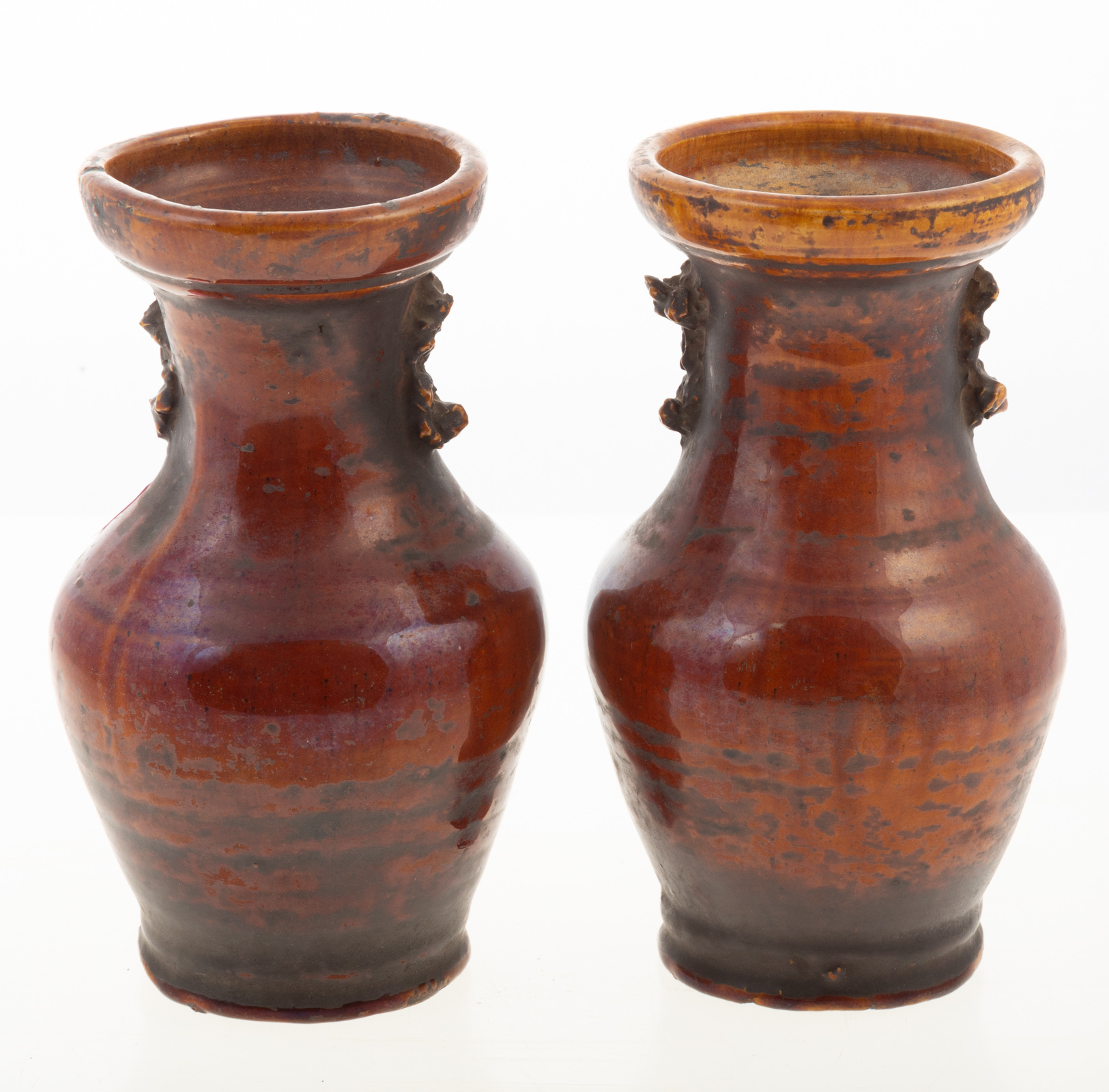A PAIR OF CHINESE BROWN GLAZED