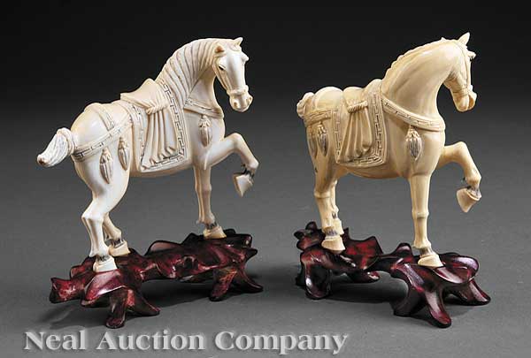 A Pair of Chinese Carved and Tinted