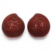 A PAIR OF CHINESE CARVED RED C