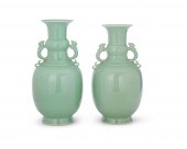 A PAIR OF CHINESE CELADON PORC