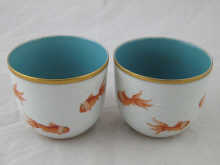 A pair of Chinese ceramic tea bowls