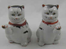 A pair of Chinese ceramic teapots