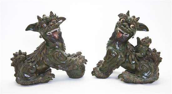 A Pair of Chinese Ceramic Fu Dogs