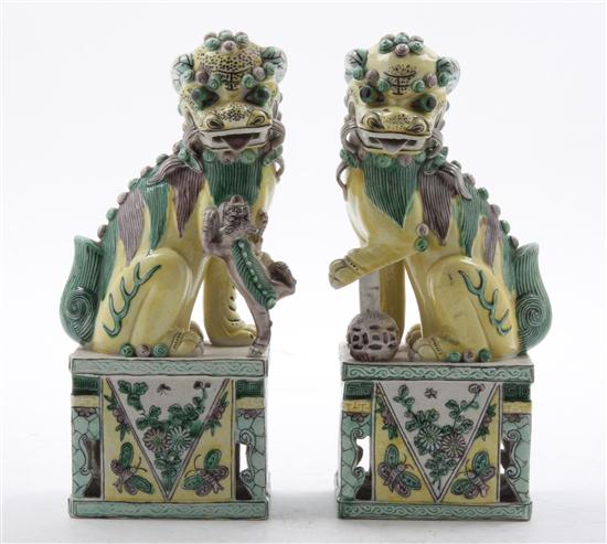 A Pair of Chinese Ceramic Fu Dogs