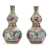 A PAIR OF CHINESE CLOBBERED DO