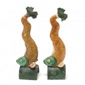 A PAIR OF CHINESE FISH ROOF TI