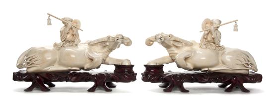 *A Pair of Chinese Ivory Figures on