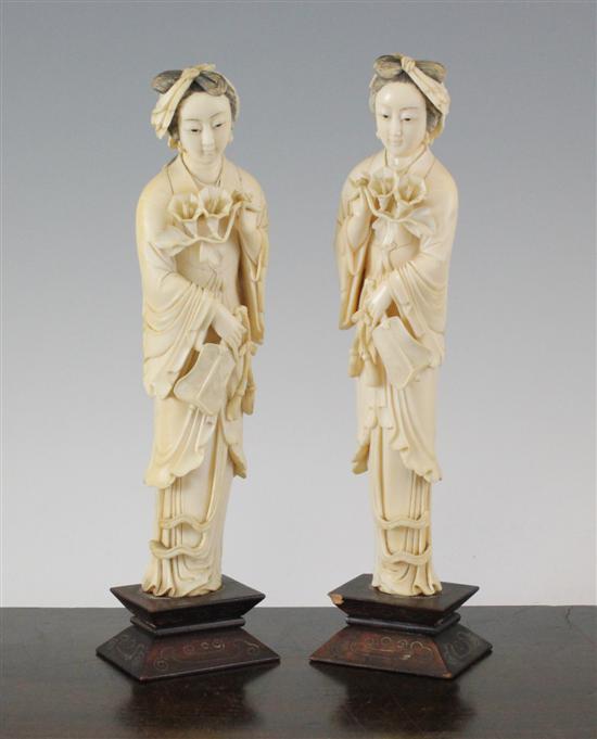 A pair of Chinese ivory figures