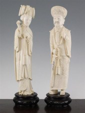 A pair of Chinese ivory standi