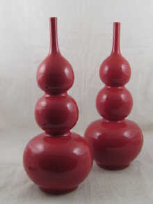 A pair of Chinese vases shaped as