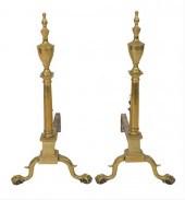 A PAIR OF CHIPPENDALE BRASS AN