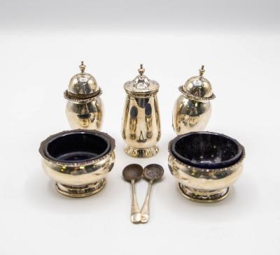 A pair of circular silver salt