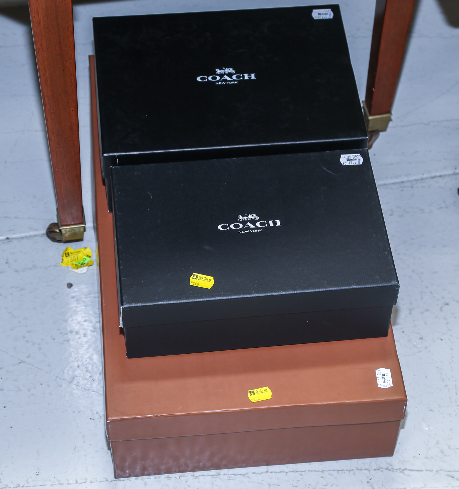 A PAIR OF COACH BOOTS & TWO PAIRS