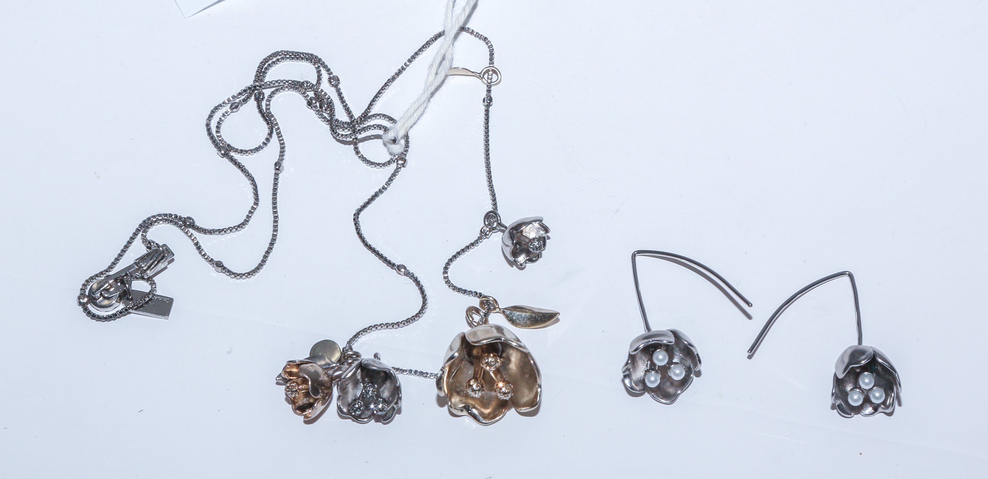 A PAIR OF COACH EARRINGS & COACH