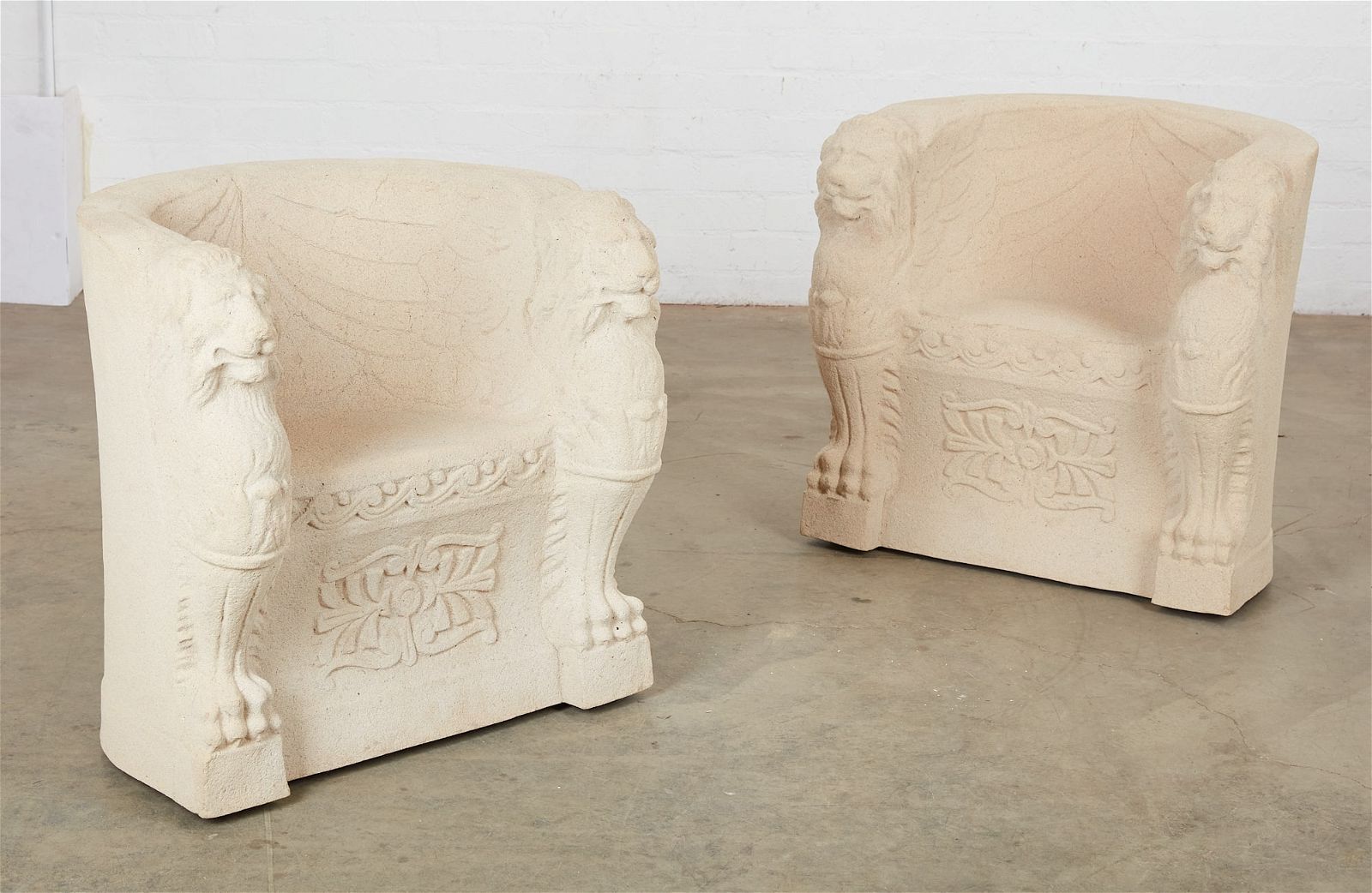A PAIR OF COMPOSITION FAUX STONE