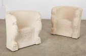 A PAIR OF COMPOSITION FAUX STO