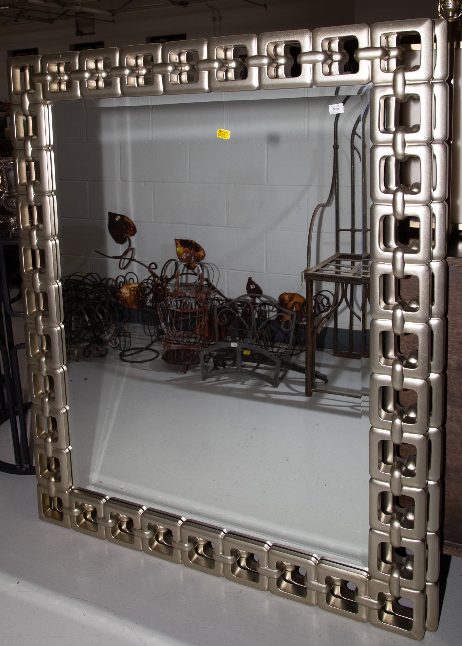 A PAIR OF CONTEMPORARY MIRRORS .