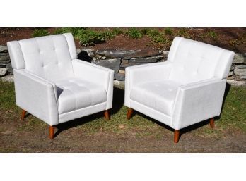 A pair of contemporary tufted