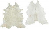A PAIR OF COWHIDE RUGSA pair o