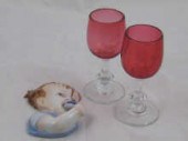 A pair of cranberry bowled gla