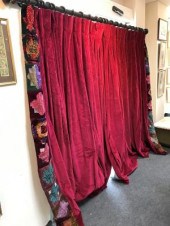 A pair of crimson velvet curta