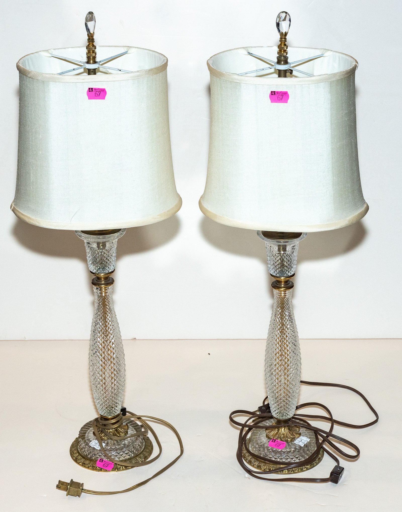 A PAIR OF CUT CRYSTAL & METAL LAMPS