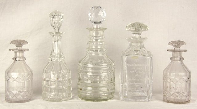 A pair of cut glass decanters