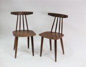 A pair of Danish teak stick ba