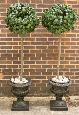 A pair of decorative urns