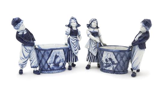 A Pair of Delft Ceramic Figural