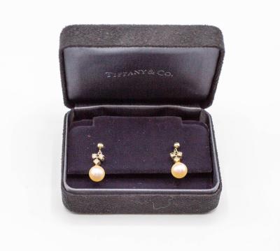 A pair of diamond and cultured