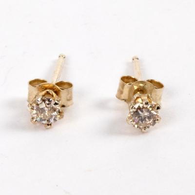 A pair of diamond ear studs, the