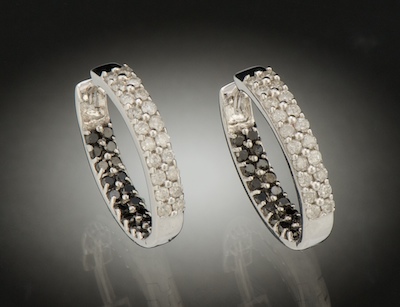 A Pair of Diamond Hoop Earrings 14k