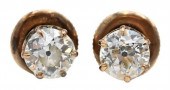A PAIR OF DIAMOND STUD EARRING