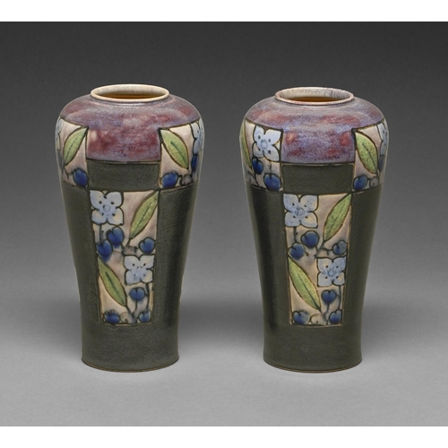 A pair of Doulton Ware vases, early