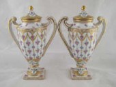 A pair of Dresden covered urns