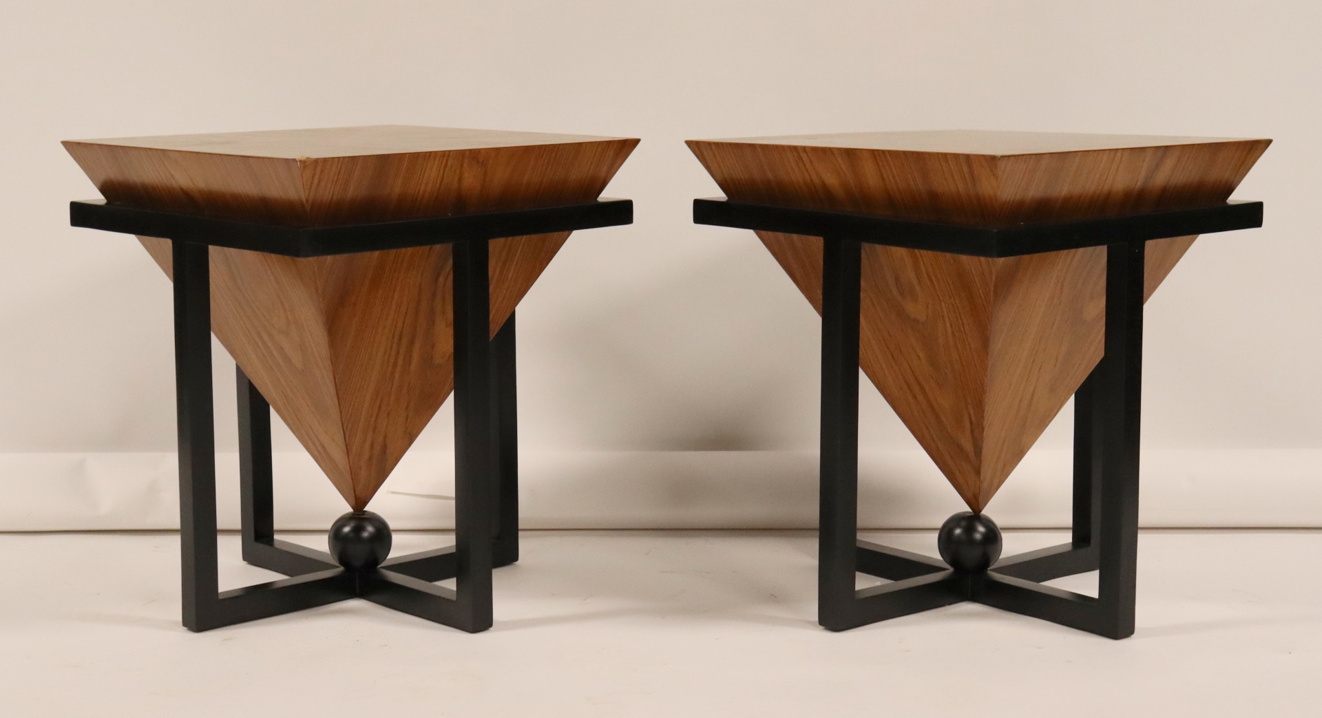 A PAIR OF EBONISED PYRAMID STYLE