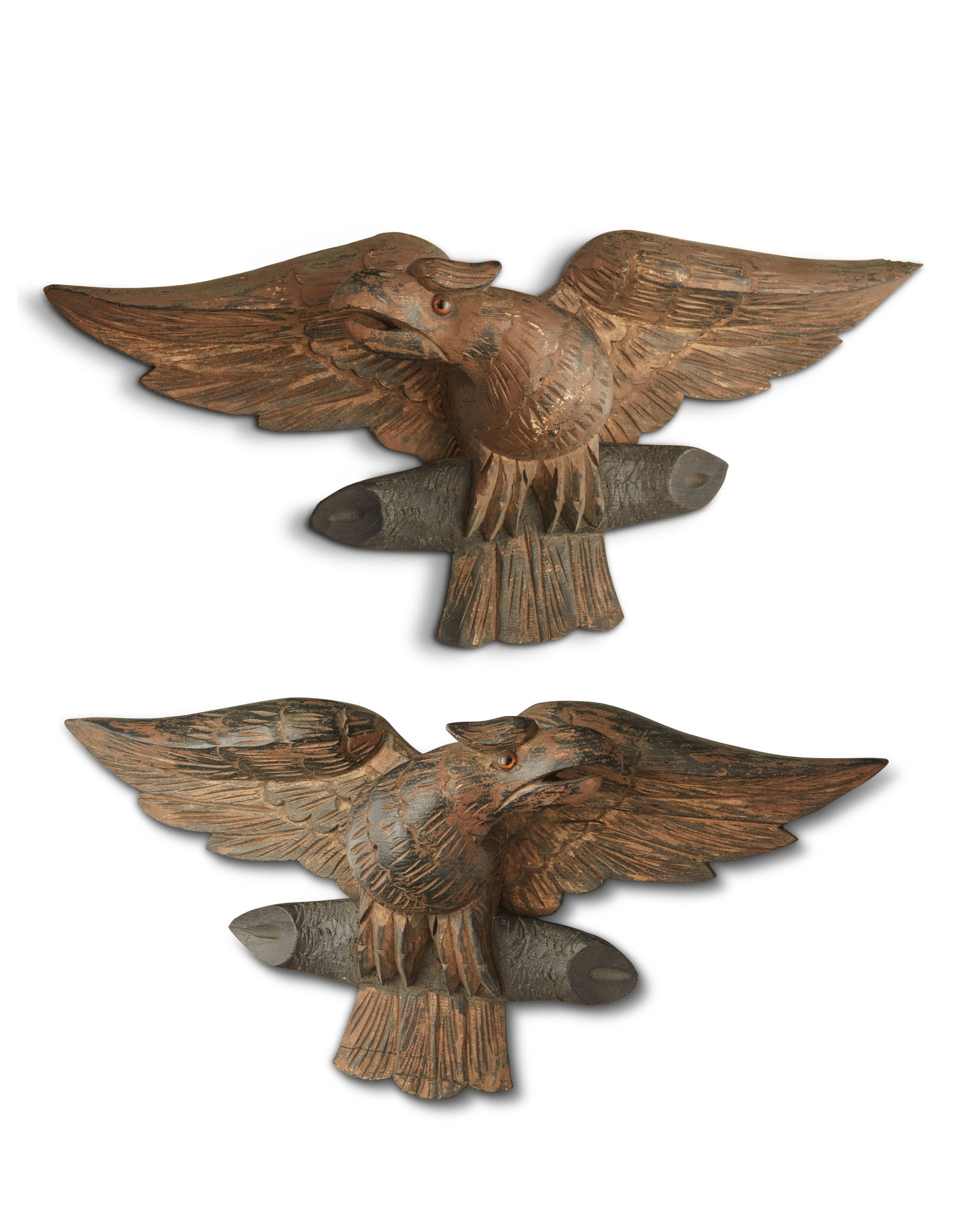 A PAIR OF EBONIZED AND GILTWOOD