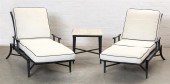 A PAIR OF EBONIZED CHAISES LOU