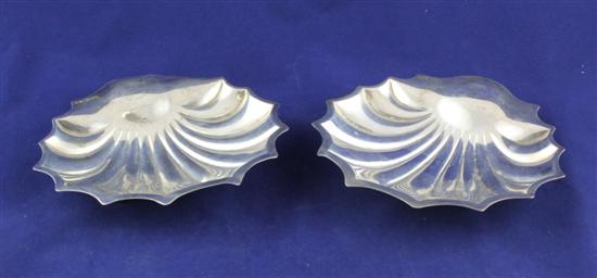 A pair of Edwardian silver butter
