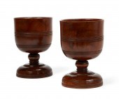 A PAIR OF ENGLISH TREEN PEDEST