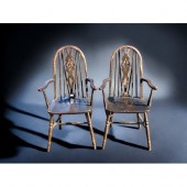 A PAIR OF ERCOL STYLE WHEEL BA