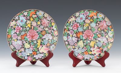 A Pair of Famille Noire Plates Hand