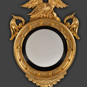 A Pair of Federal Giltwood Bull's