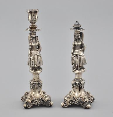 A Pair of Figural Silver